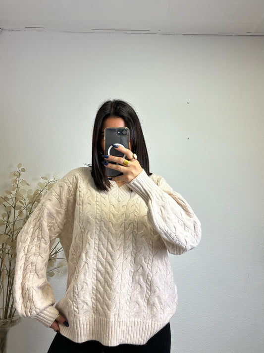 Malha entrelaçada com Decote em V